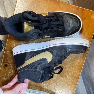 Nike , high top , black and gold shoes